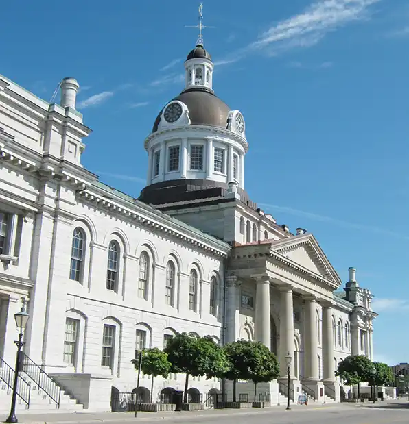 kingston's City Hall, a large limestone building in downtown kingston, Ontario.
